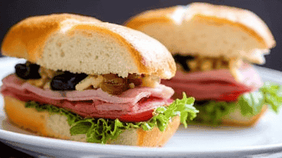 Muffuletta Sandwich New OrleansStyle with Olive Salad Cold Cuts Provolone